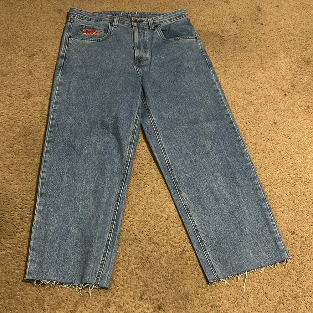 These are plain relaxed/baggy fit jeans with a custom bapesta image on the bac